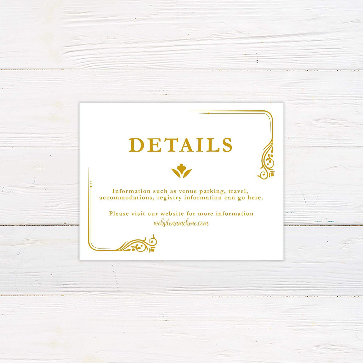 Wedding detail card with gold decorative flourishes and elegant serif font for enchanted wedding theme.