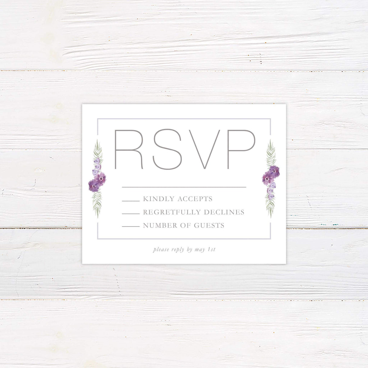 Lavender RSVP card with matching watercolor florals and clean serif fonts for modern wedding theme.