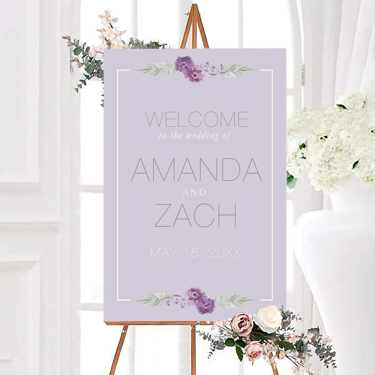 Lavender one fine day wedding welcome sign with delicate purple watercolor flowers, greenery, and a simple white border. The design features personalized couple names and a wedding date.