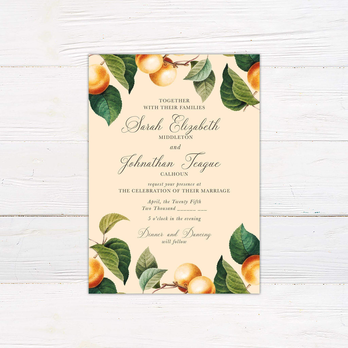 Wedding invitation with vintage watercolor oranges and green leaves, featuring elegant script on a warm cream background.