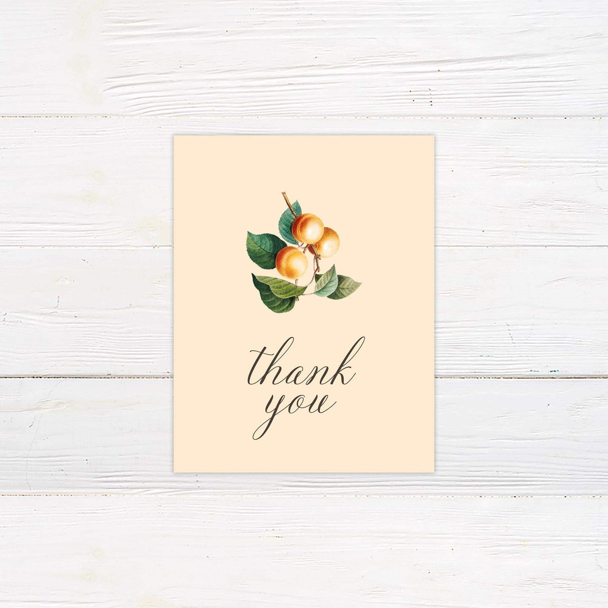 Thank you card with vintage-style watercolor oranges and green leaves, featuring elegant calligraphy.
