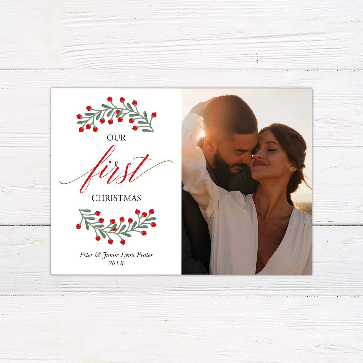 A holiday card with a romantic couple photo on one side and festive text with red berries on the other. The design is warm, simple, and celebratory.