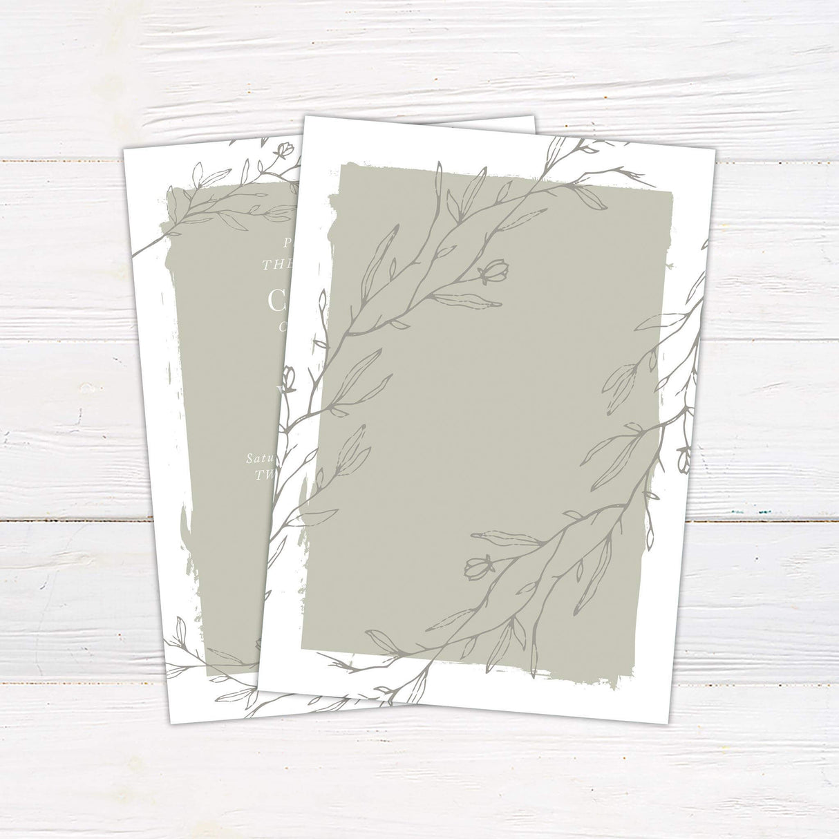 Sage green wedding invitation with painted background, minimalist floral line art, and elegant script and serif fonts. - back side