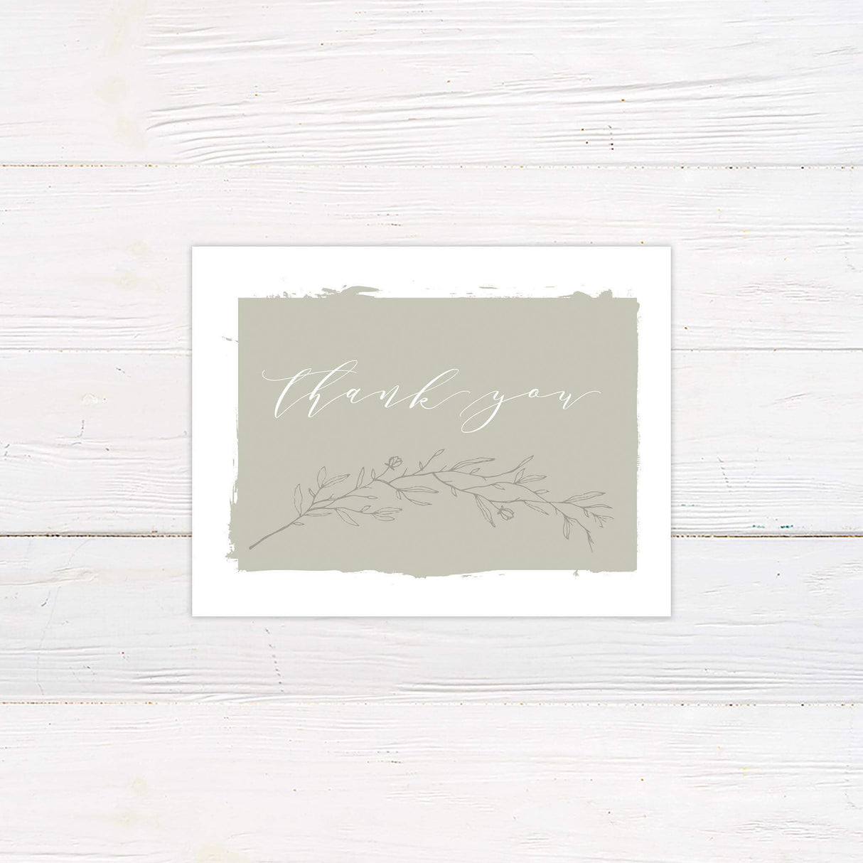 Thank you card with hand-painted sage backdrop, delicate line florals, and stylish handwritten script.