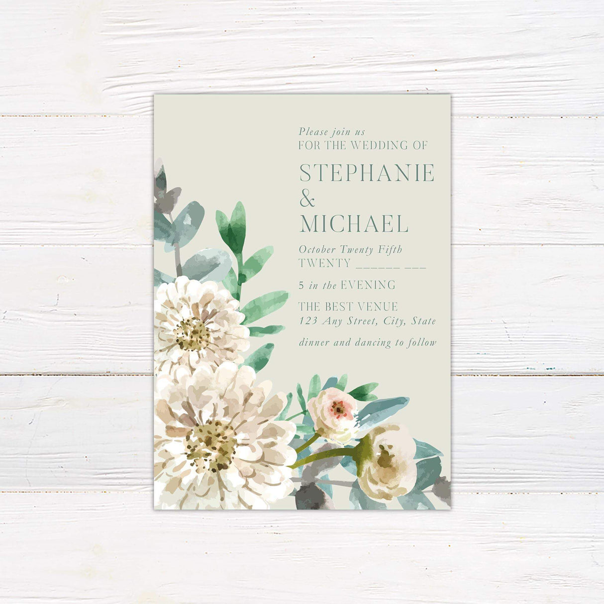 Sage green wedding invitation with white painted flowers, watercolor eucalyptus greenery, and elegant serif fonts.