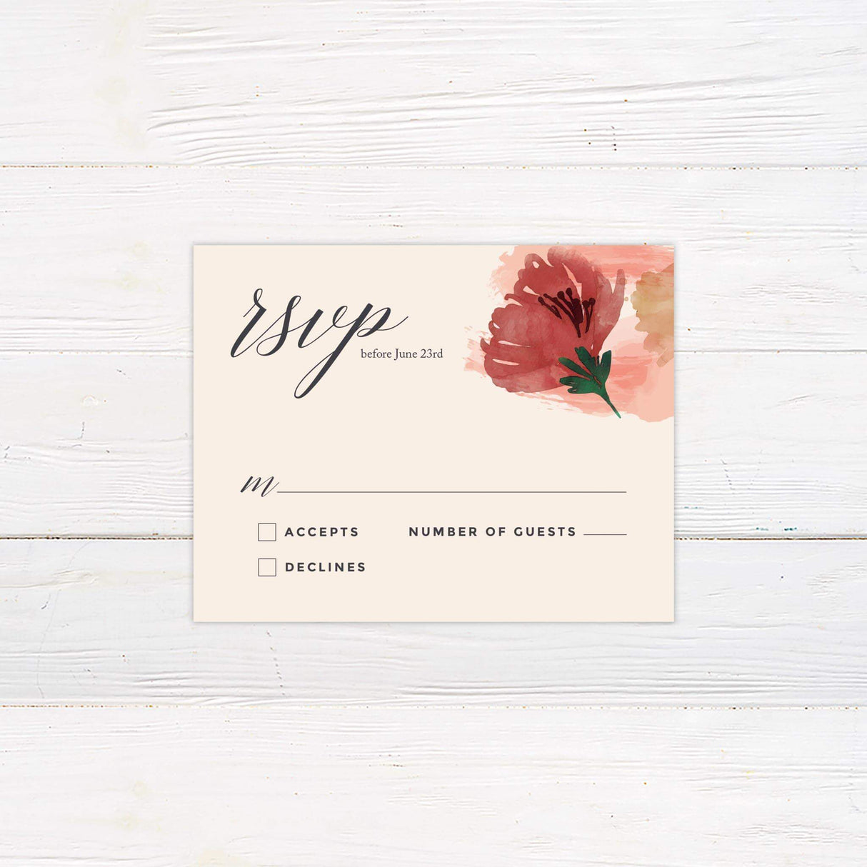 RSVP card with blush and red watercolor brushstrokes and matching modern fonts on a cream background.