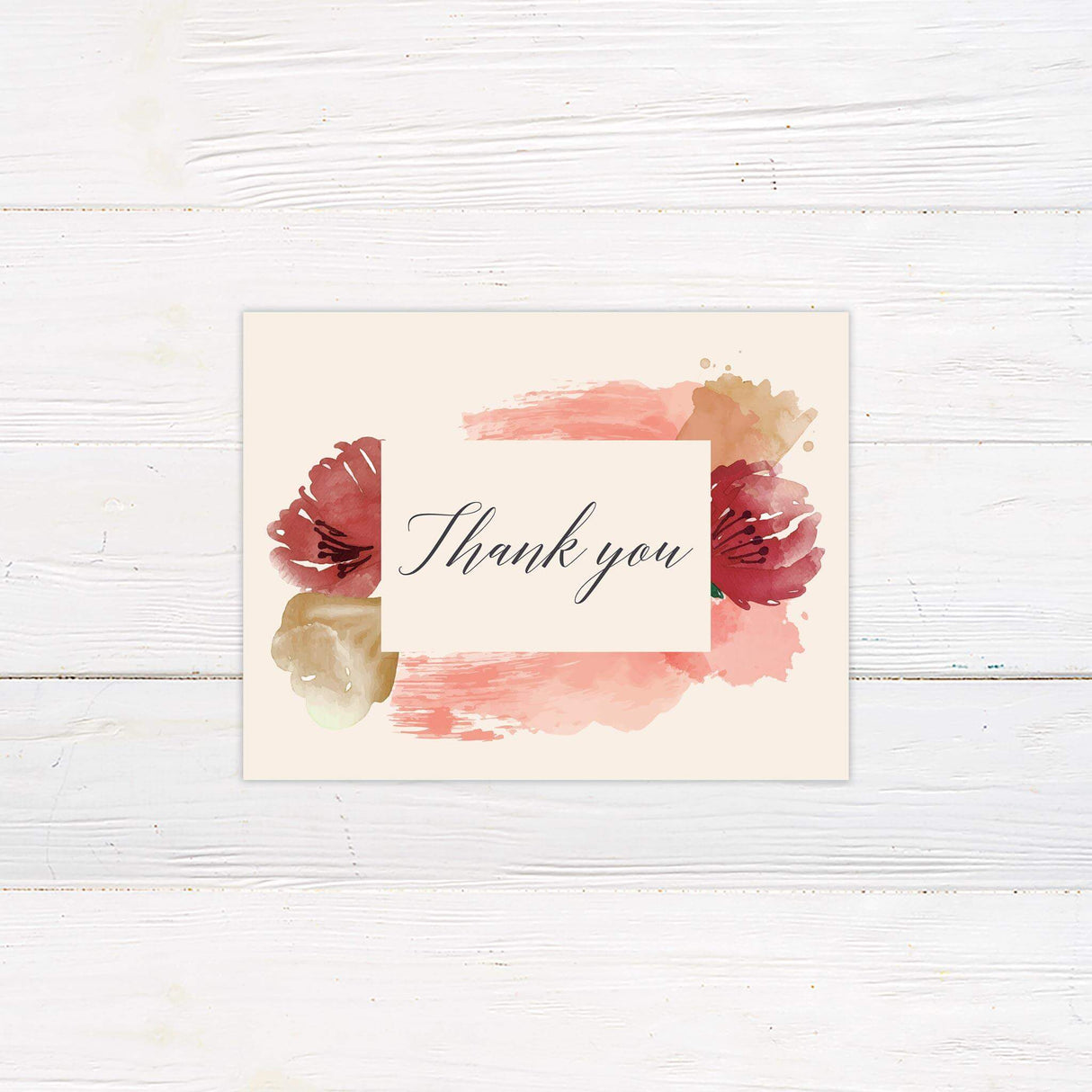 Thank you card with red and pink floral watercolor accents and elegant script for a stylish artistic touch.