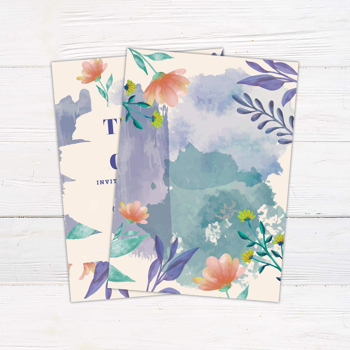 Colorful watercolor floral wedding invitation with bold serif names, playful script, and painted brushstroke accents on a cream background. - back side