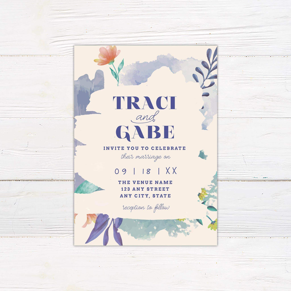 Colorful watercolor floral wedding invitation with bold serif names, playful script, and painted brushstroke accents on a cream background.