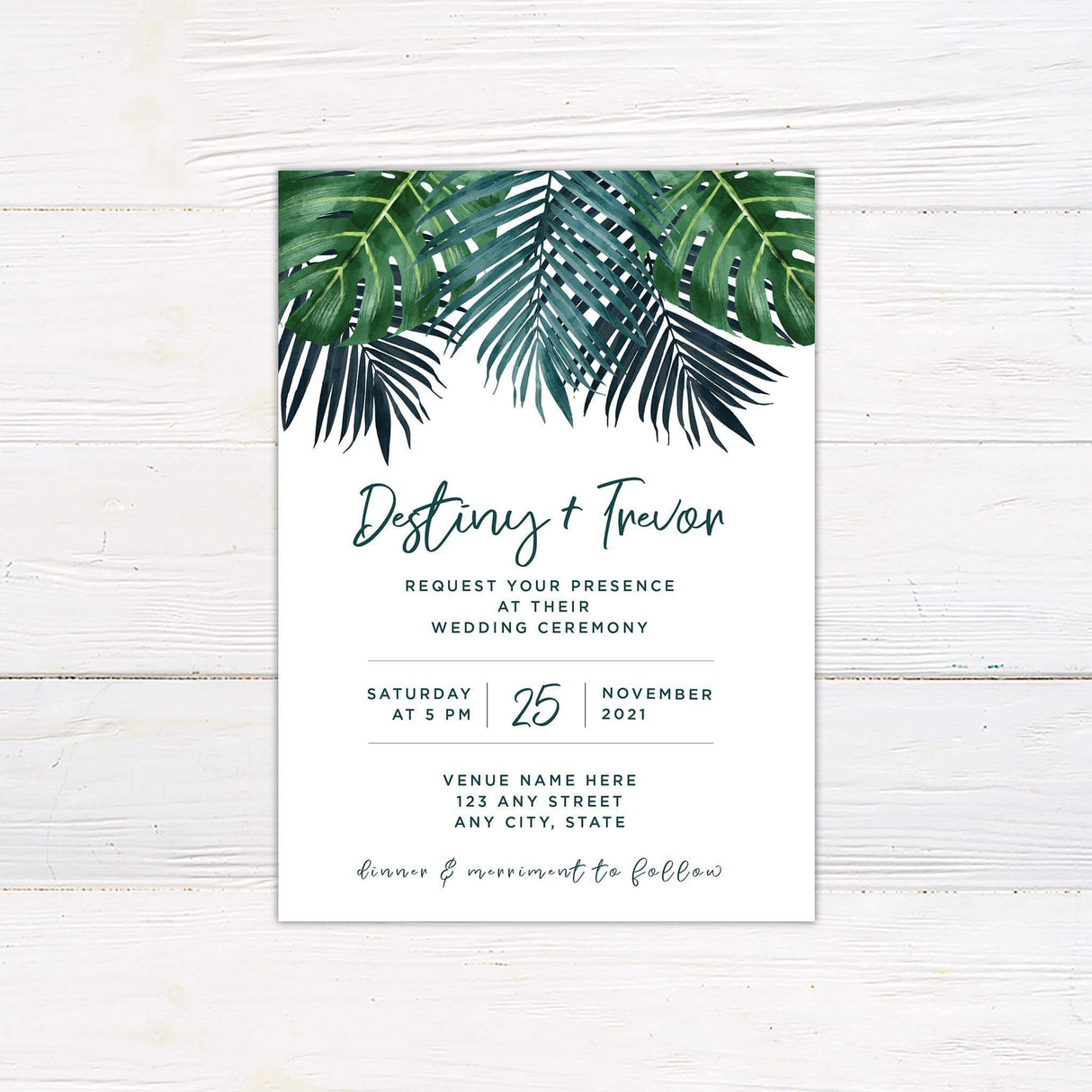 Tropical wedding invitation with green watercolor palm leaves and modern script fonts on a clean white background.