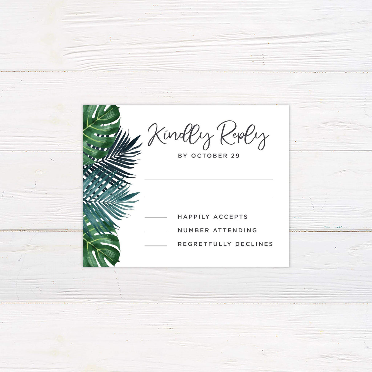 RSVP card with matching green watercolor palm leaves and minimalist layout on a white background.