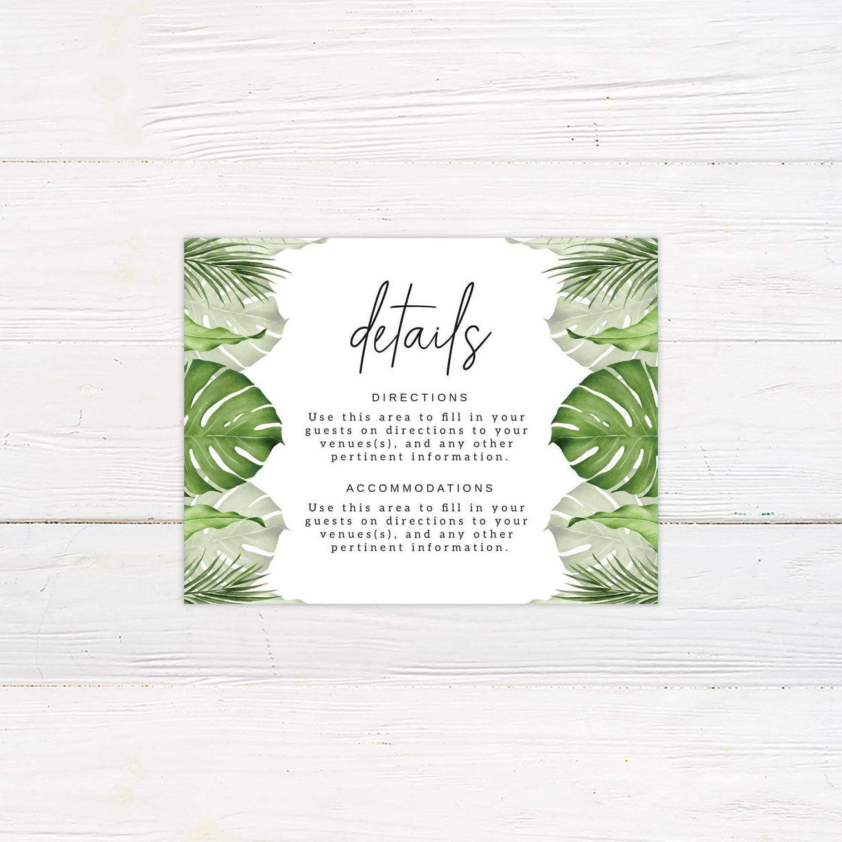 Wedding detail card featuring green tropical leaf accents with clean serif and script fonts.