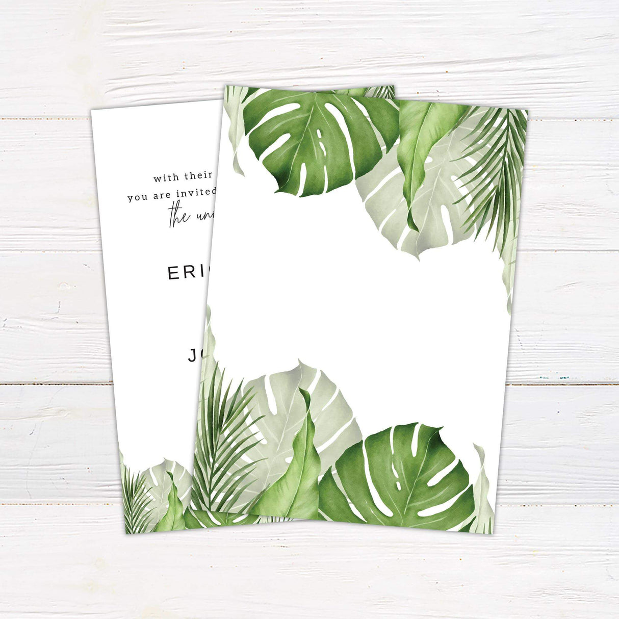 Minimalist wedding invitation with green watercolor palm and monstera leaves, modern serif and script fonts on white background.- back side