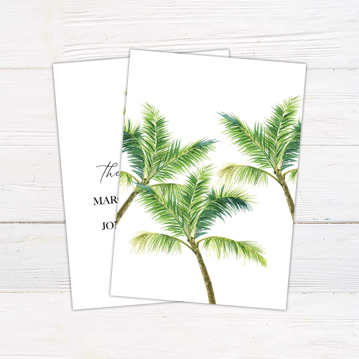 Minimalist tropical wedding invitation with watercolor palm tree and elegant black serif and script fonts on a clean white background.- back side