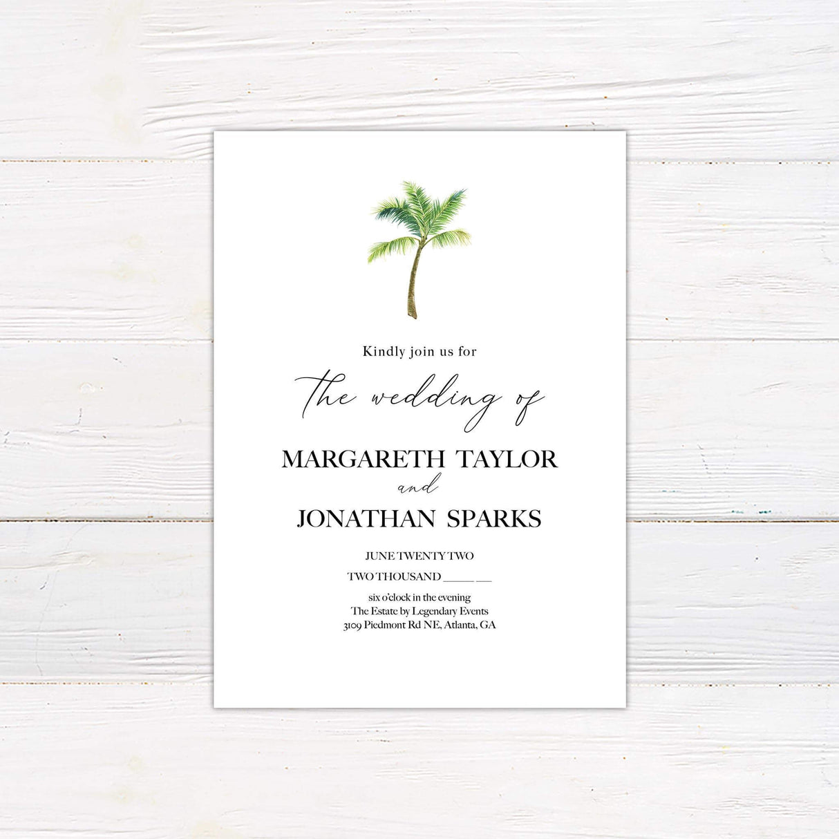 Minimalist tropical wedding invitation with watercolor palm tree and elegant black serif and script fonts on a clean white background.