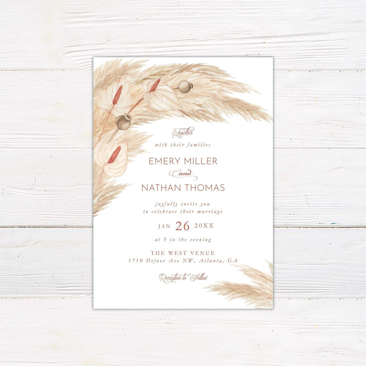 Boho wedding invitation with watercolor pampas grass, terracotta script, and neutral floral accents on a white background.