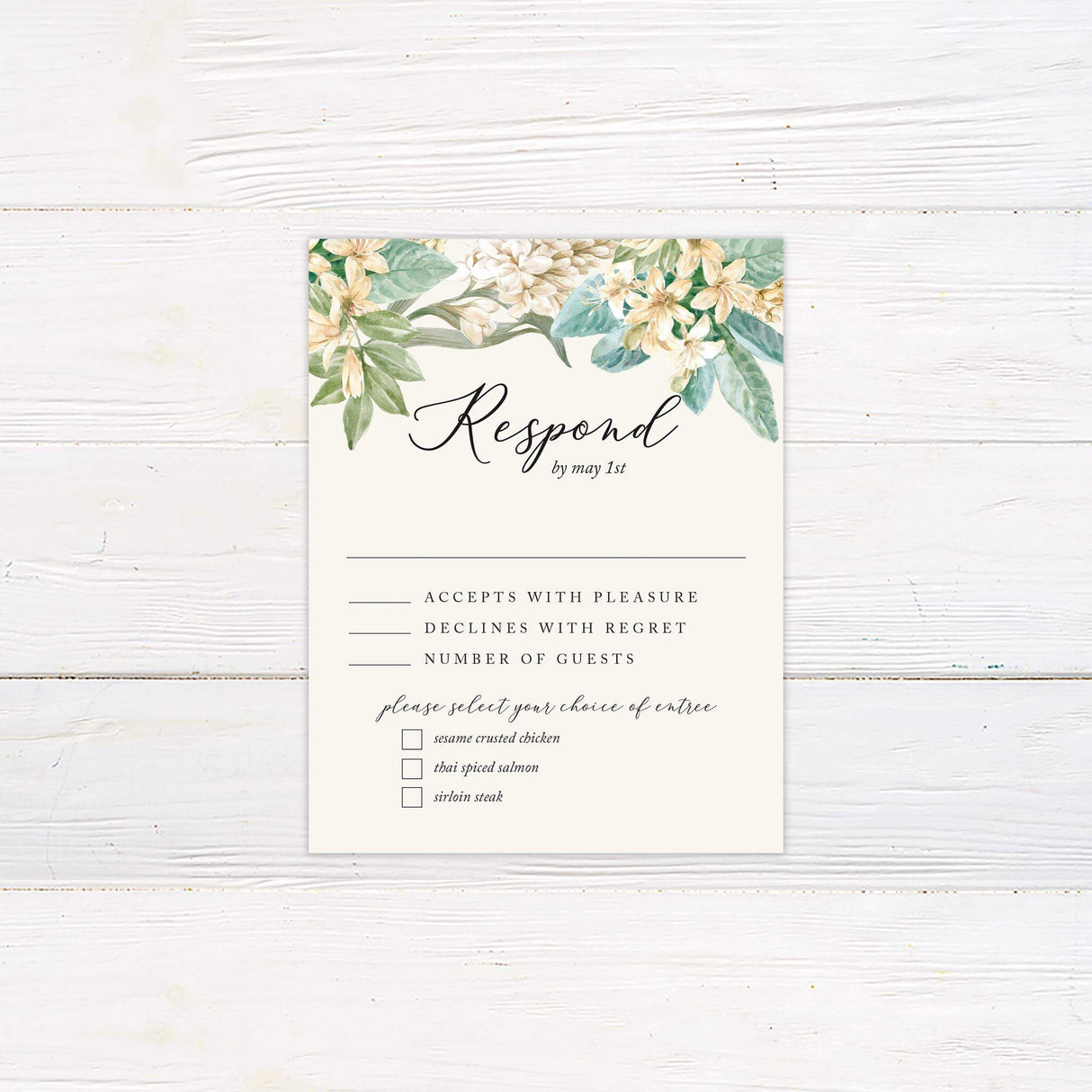 RSVP card with matching blush border, watercolor florals, and modern serif and script font layout.