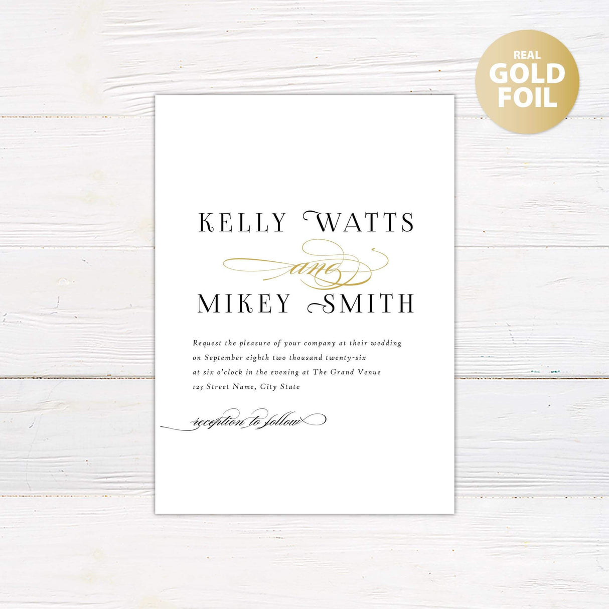 Simple script invitation with mixed fonts. Names of bride and groom in all caps and a simple font with the word and in gold Calligraphy in between.