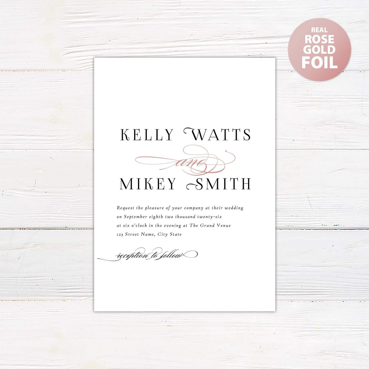 Simple script invitation with mixed fonts. Names of bride and groom in all caps and a simple font with the word and in rose gold Calligraphy in between.