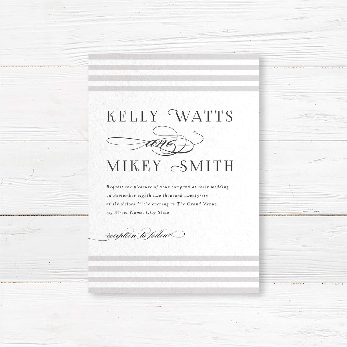 Paragraph Style Striped Wedding Invitation - Wedding invitation featuring soft horizontal taupe and ivory stripes at the top and bottom, elegant serif fonts for names, romantic flourished script accents, and a white center panel.