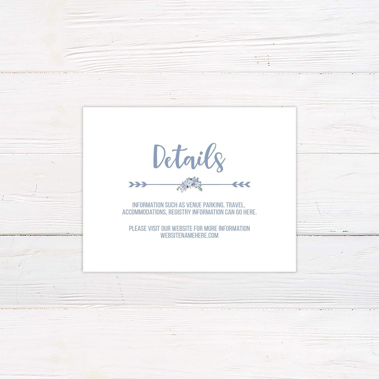 Wedding detail card featuring soft blue floral accents and classic serif text layout.