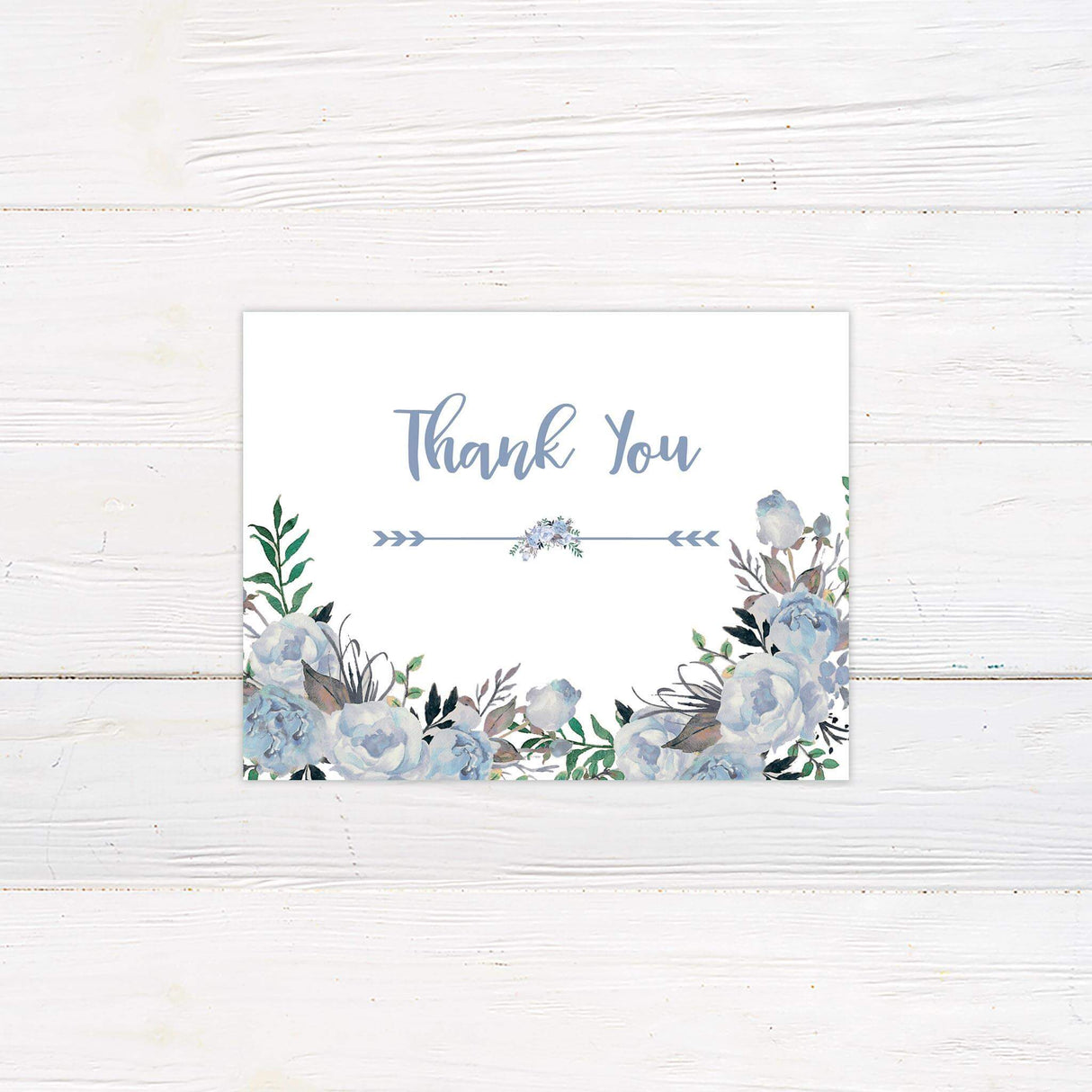 Thank you card with pastel blue florals and handwritten-style script, ideal for romantic weddings.