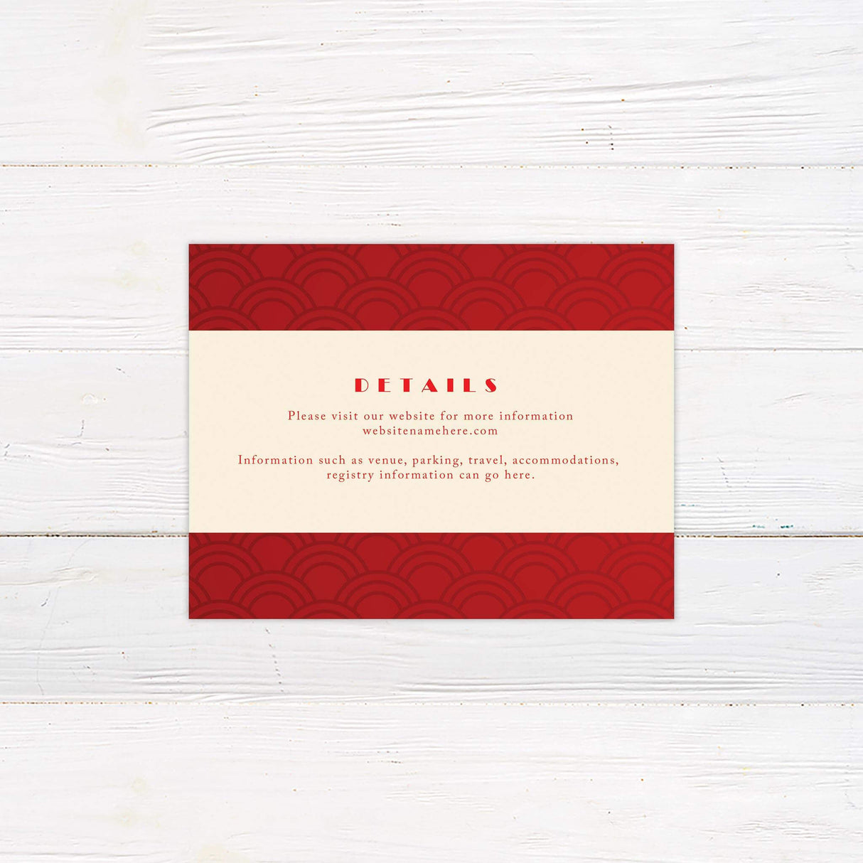 Wedding detail card featuring bold red geometric accents and elegant typography on a cream base.