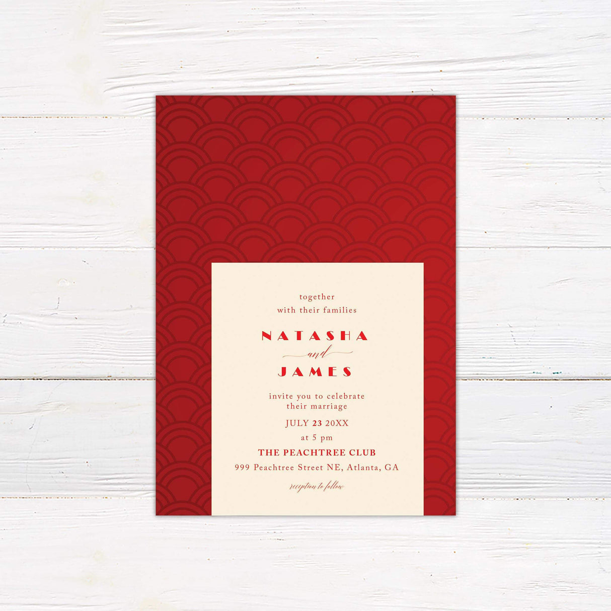 Wedding invitation with red geometric Art Deco fan pattern, cream center panel, and modern serif and script fonts.