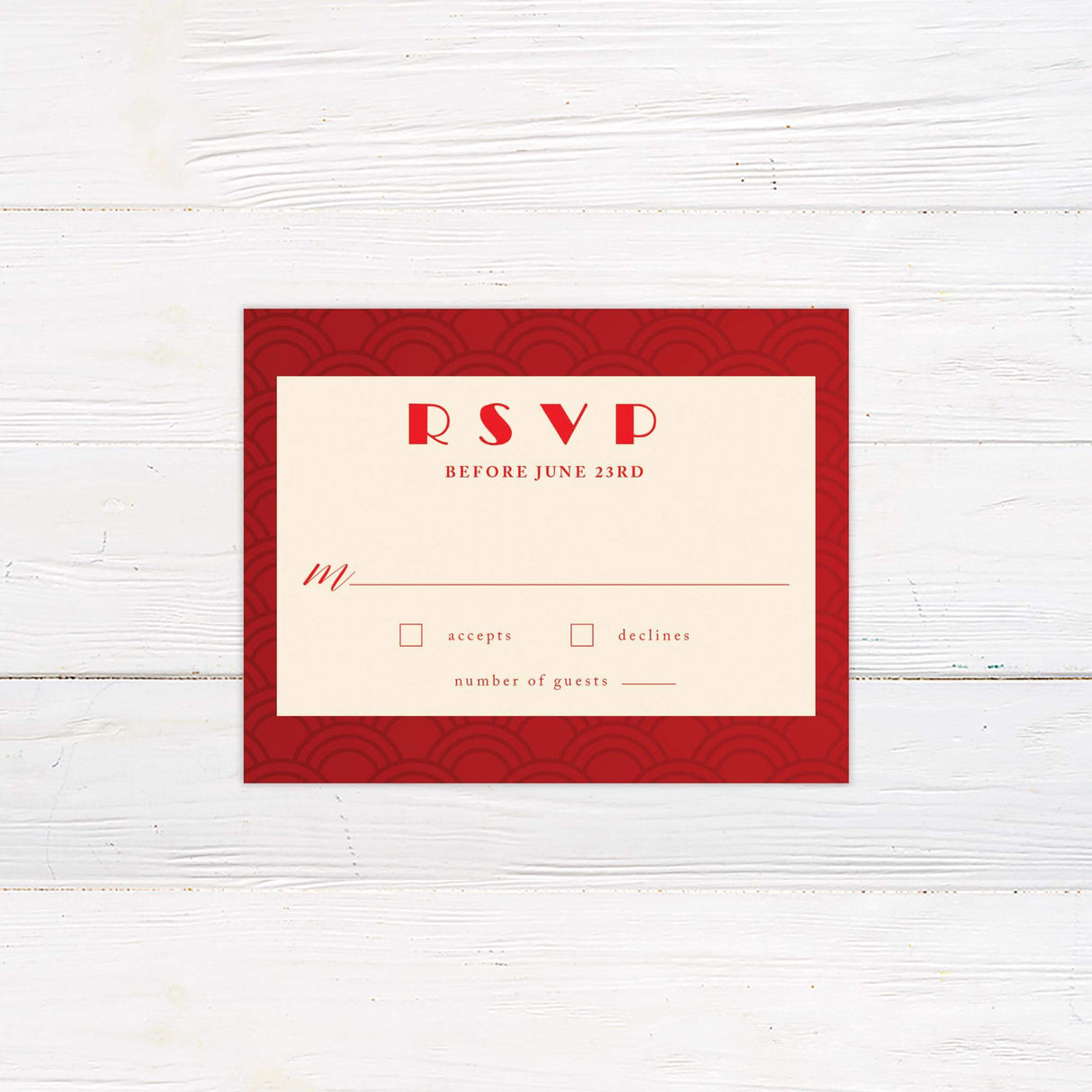 RSVP card with coordinating red fan pattern background, cream panel, and modern serif fonts.