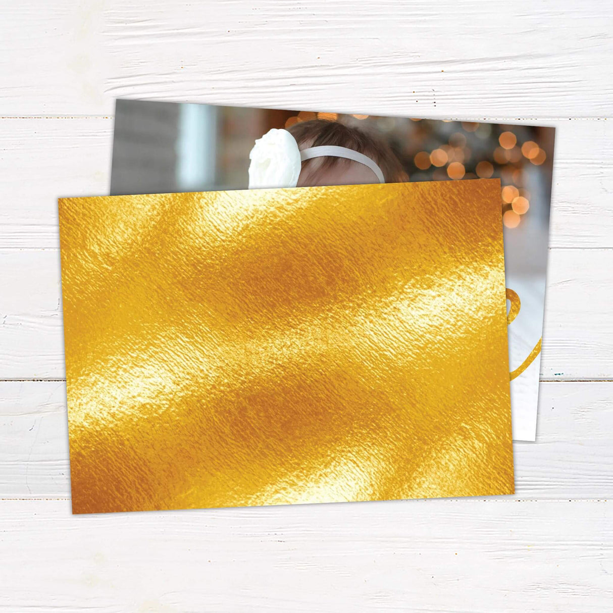 A holiday card design that allows a full photo to cover the entire background. The word "peace" is displayed in bold gold script across the front. - back.