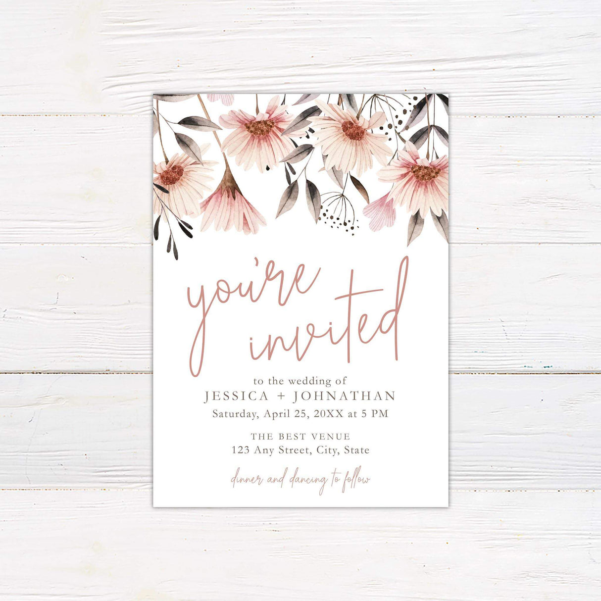 Beautiful peach daisies adorn the top of this invitation. Handwritten cursive script for main wording is in a deep peach color complimenting the center of the flowers.