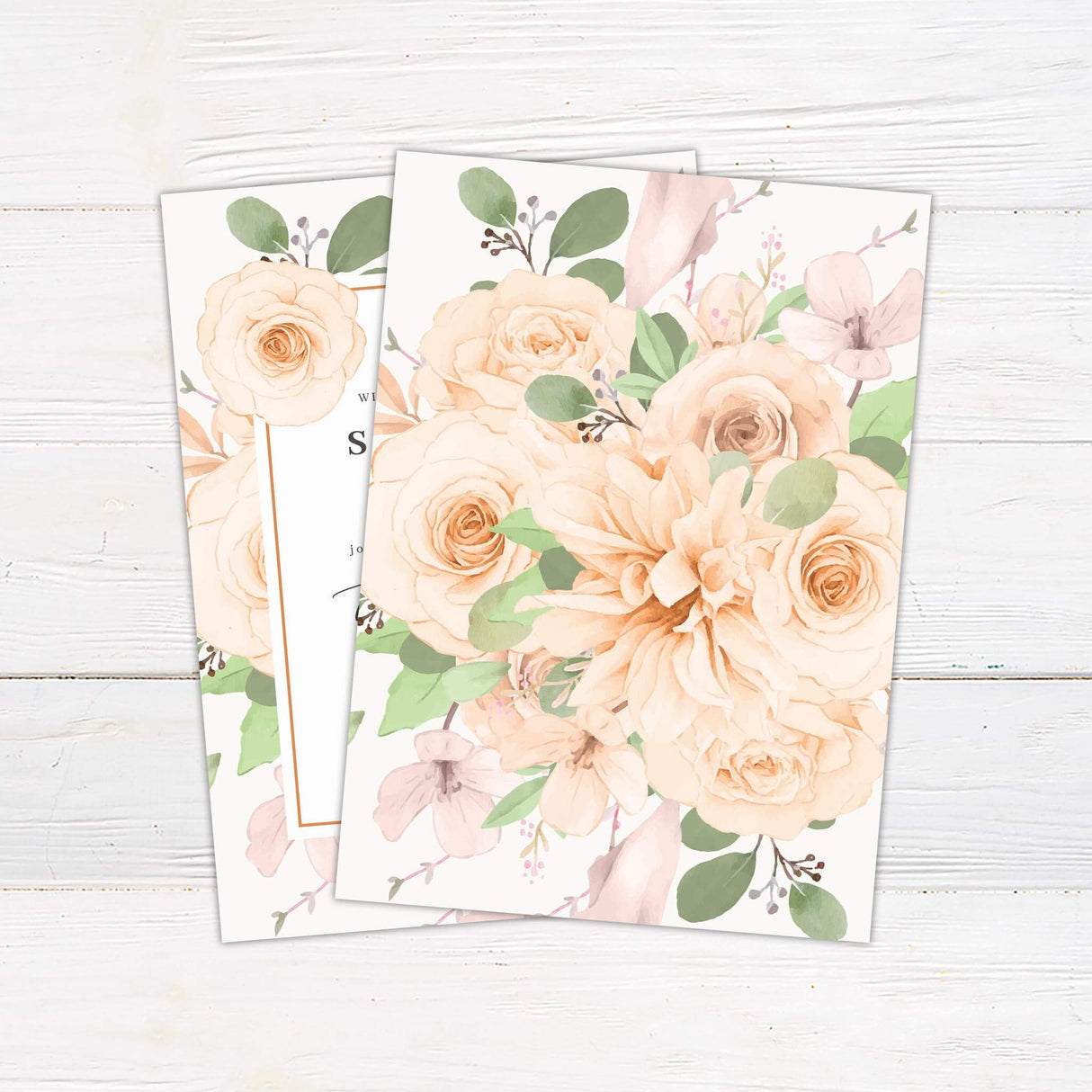 A wedding invitation with a soft cream background features elegant watercolor roses and florals in blush, beige, and green tones framing the design. The text is centered within a thin, rose gold-bordered rectangle, using a mix of serif and script fonts for a timeless and romantic feel. Event details, including the date, time, and venue, are clearly displayed in a balanced layout. This design exudes sophistication and charm, perfect for classic, garden, or vintage-inspired weddings. Back