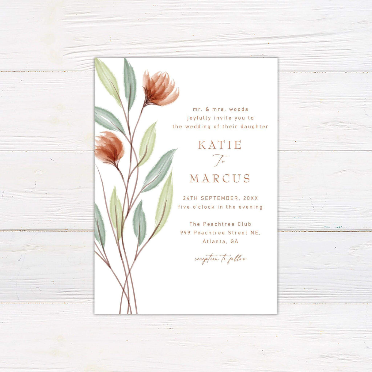 Minimalist wedding invitation with watercolor peach wildflowers and green leaves on a white background with modern serif and script fonts.