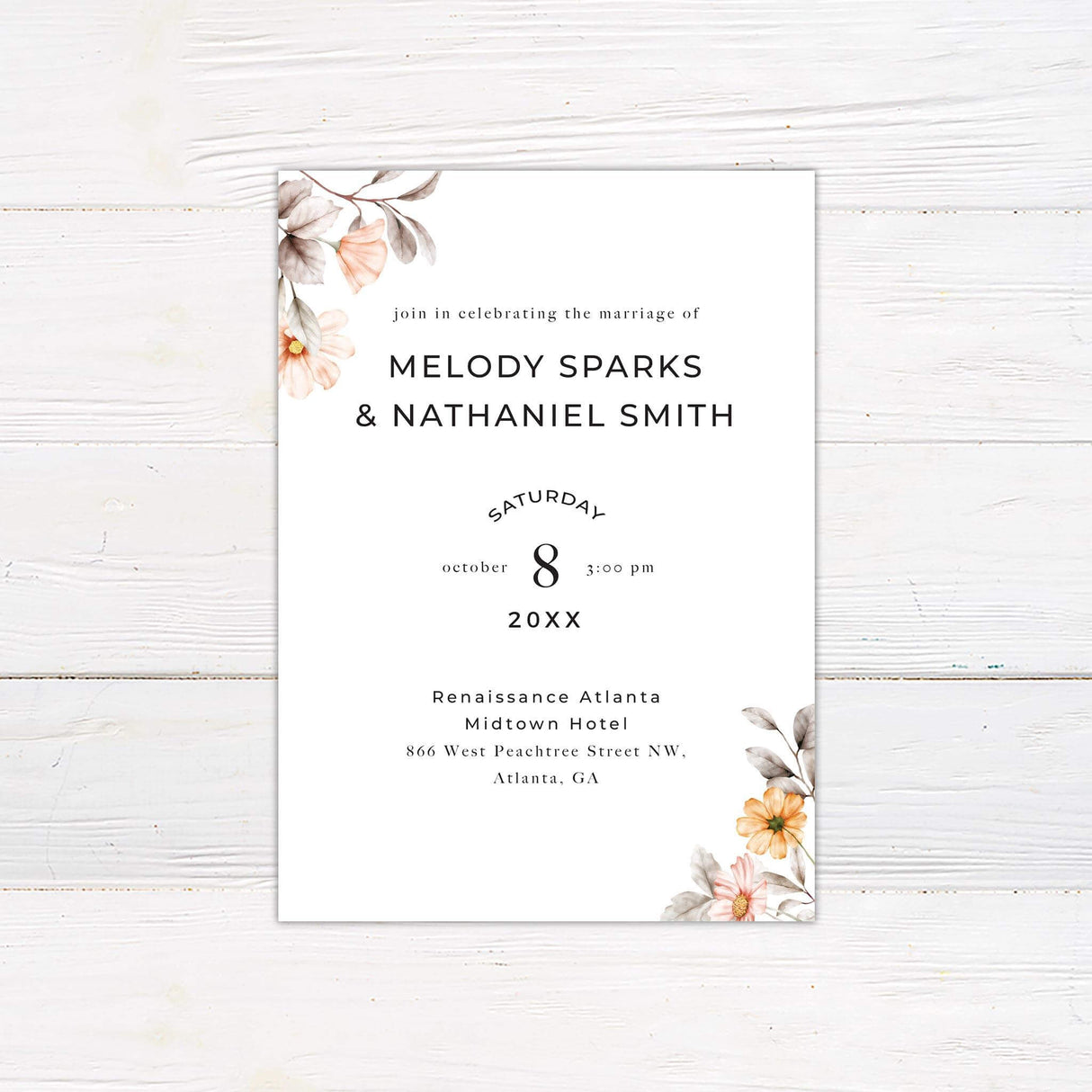Minimalist wedding invitation with peach and blush watercolor flowers and elegant black serif fonts on a clean white background.