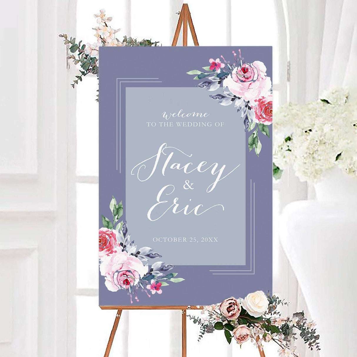 Periwinkle rose wedding welcome sign featuring pink watercolor roses, greenery, and elegant white calligraphy. The design displays the couple’s names and wedding date on a soft blue-gray background.