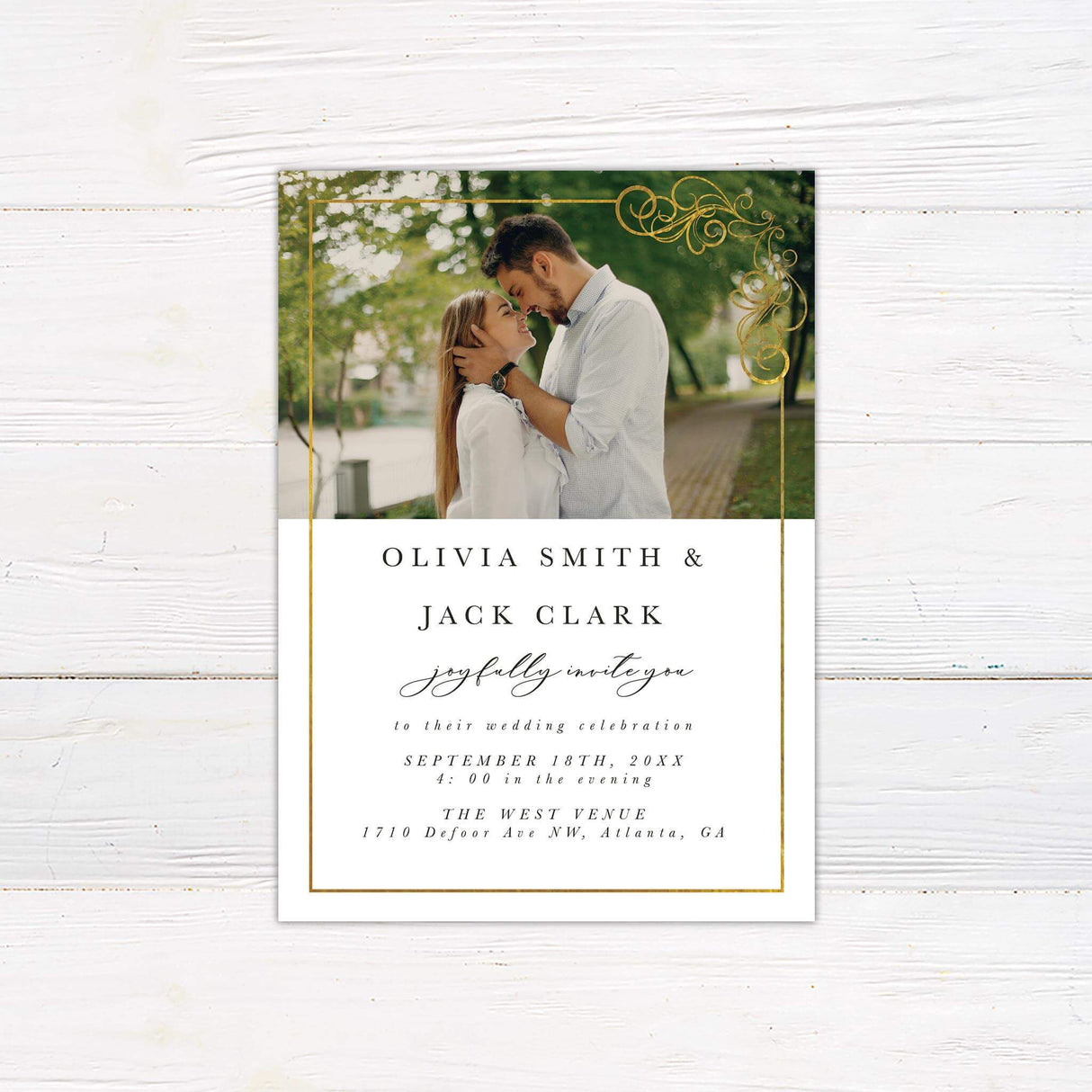 Wedding invitation with photo at the top, gold foil frame, and elegant serif and script fonts on a white background.