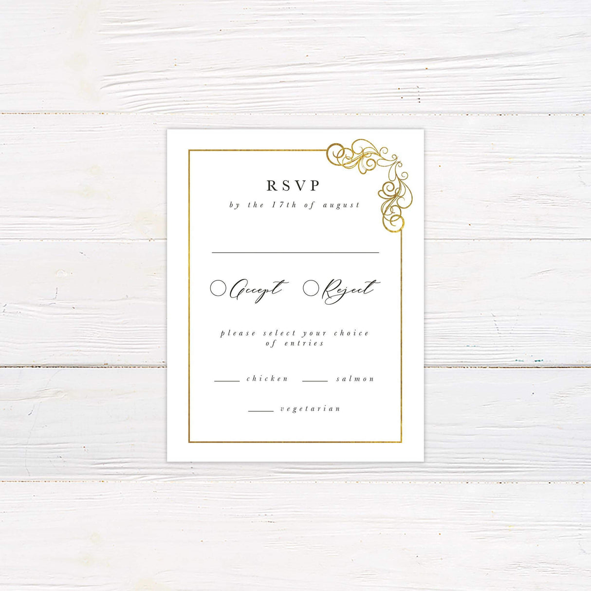RSVP card with coordinating white and gold design, serif text, and elegant script.