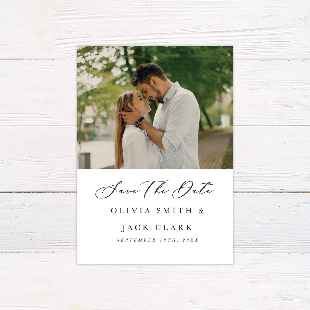 Save the date card featuring a full-width photo with gold foil border and minimalist modern typography.