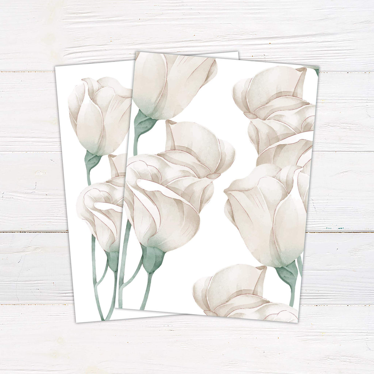 Wedding invitation with white watercolor roses, soft green leaves, and elegant serif and script fonts on a minimalist white background.- back side