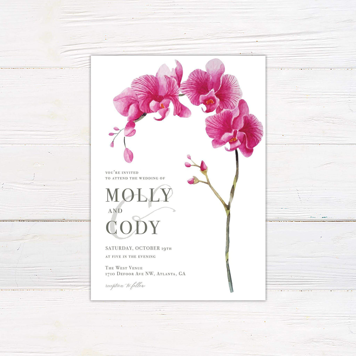 Elegant wedding invitation featuring watercolor pink orchids and a modern, minimalist design. A sophisticated floral layout perfect for tropical, romantic, and garden weddings.