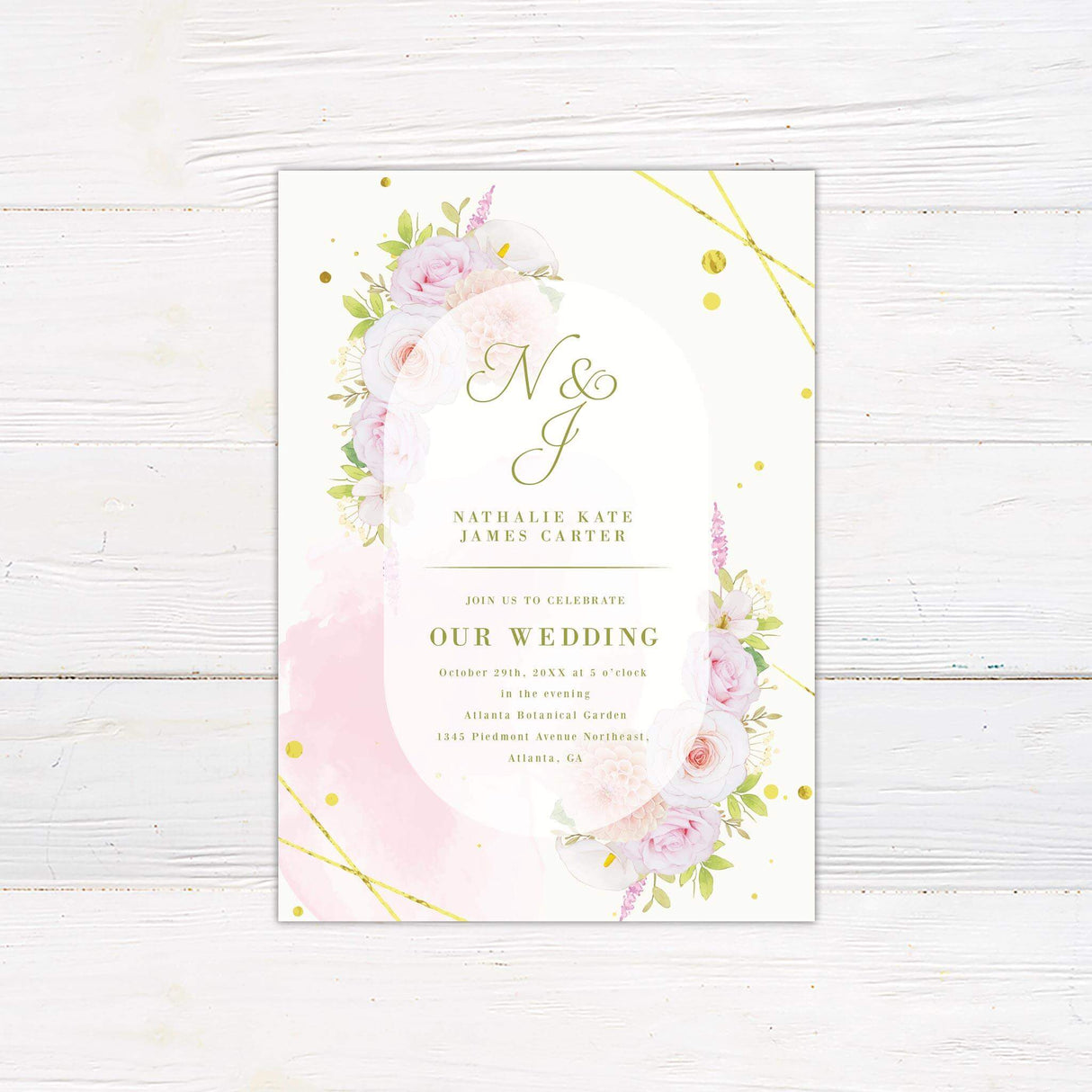 Blush pink floral wedding invitation with watercolor border, soft roses and gold accents, featuring arch-shaped white panel and elegant fonts.