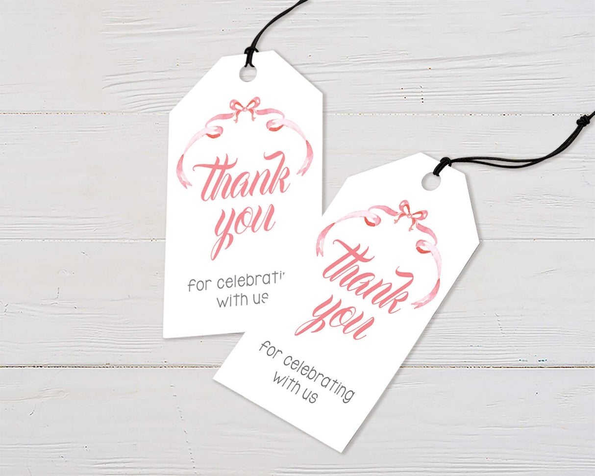 Elegant thank you tags with ribbon design on white background for party favors, featuring hand-lettered script.