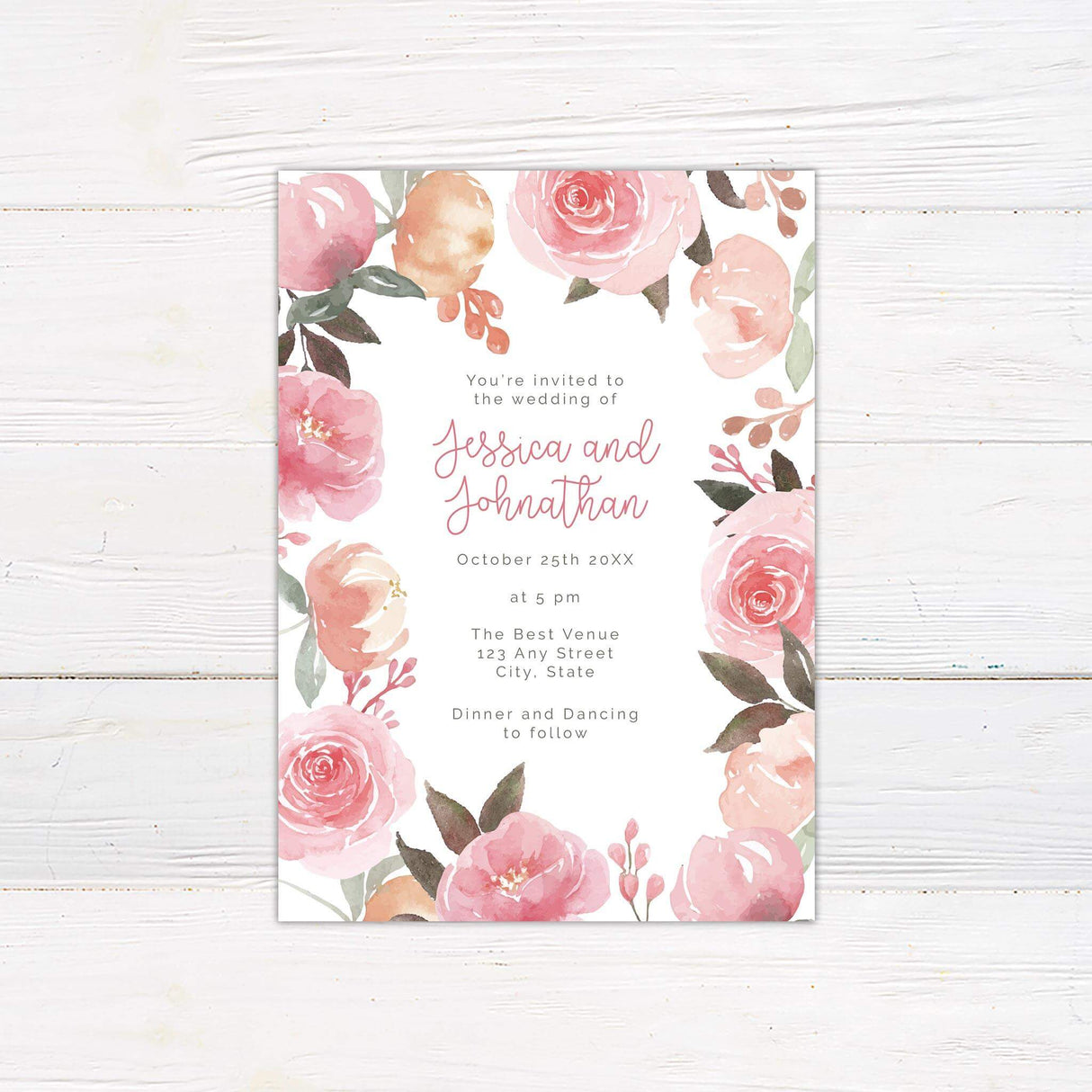 Wedding invitation with watercolor pink and peach garden roses framing the text, with playful script and serif fonts on a white background.