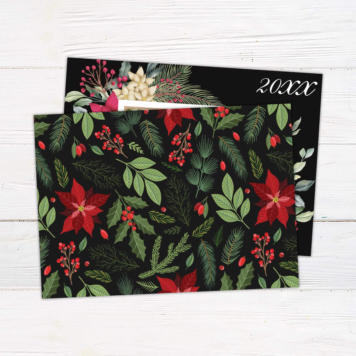 Holiday photo card featuring poinsettia floral frame on black background with personalized family photo and Christmas greeting. back side