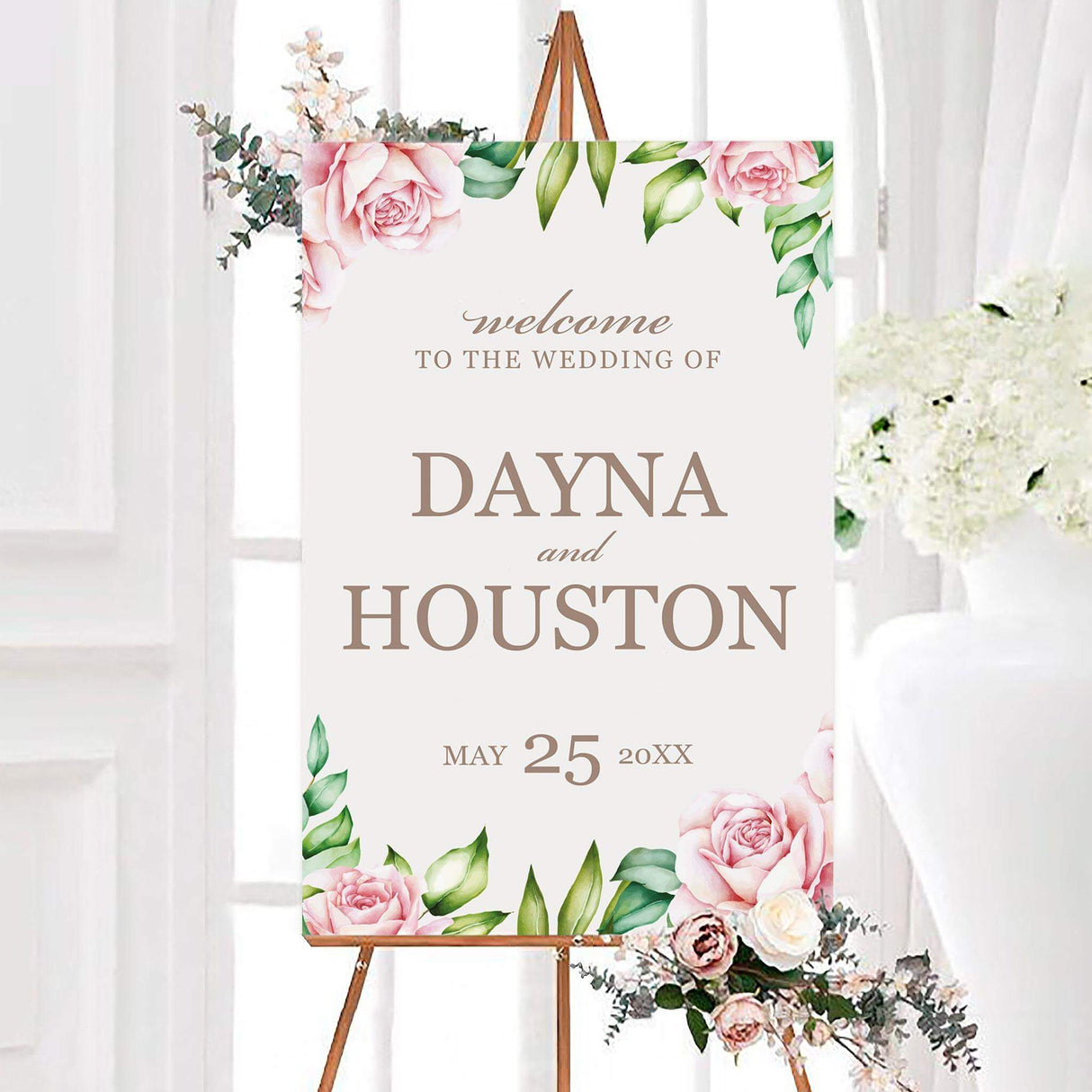 Pink pretty peonies wedding welcome sign featuring watercolor blush flowers and green leaves around a soft white background. Personalized couple names and wedding date appear in elegant neutral typography.