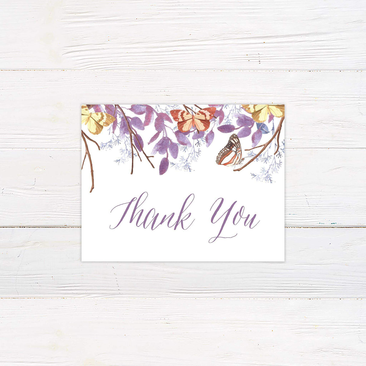 Thank you card featuring delicate butterflies and purple leaves with coordinating typography.