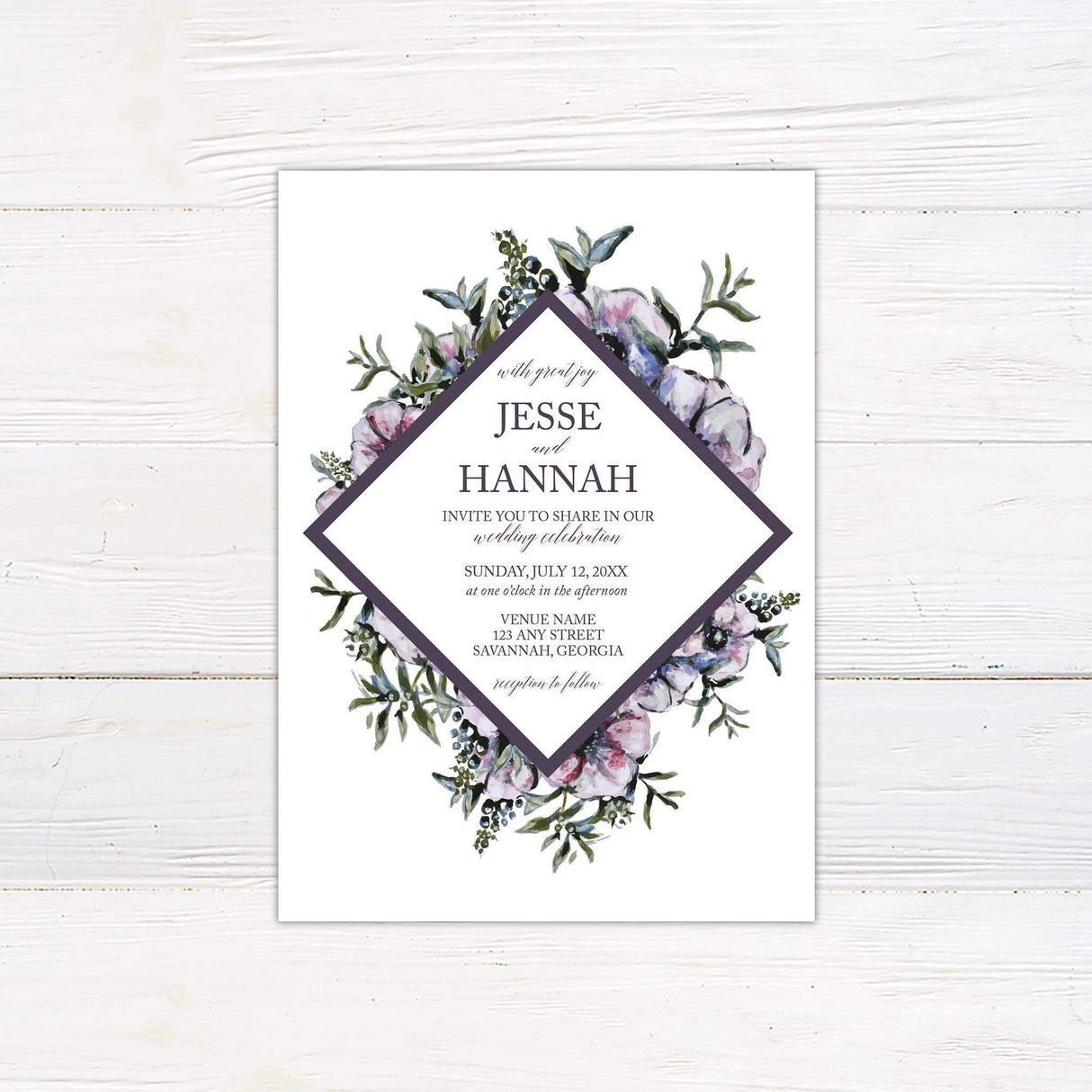 Diamond-shaped wedding invitation with purple watercolor flowers, sage green leaves, and elegant script and serif fonts on white background.