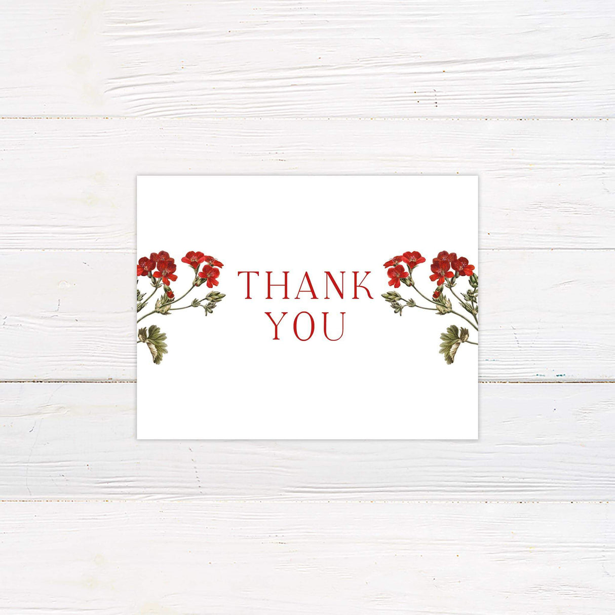 Elegant thank you card with matching red flower motif and coordinating serif text, perfect for sending appreciation after the wedding.