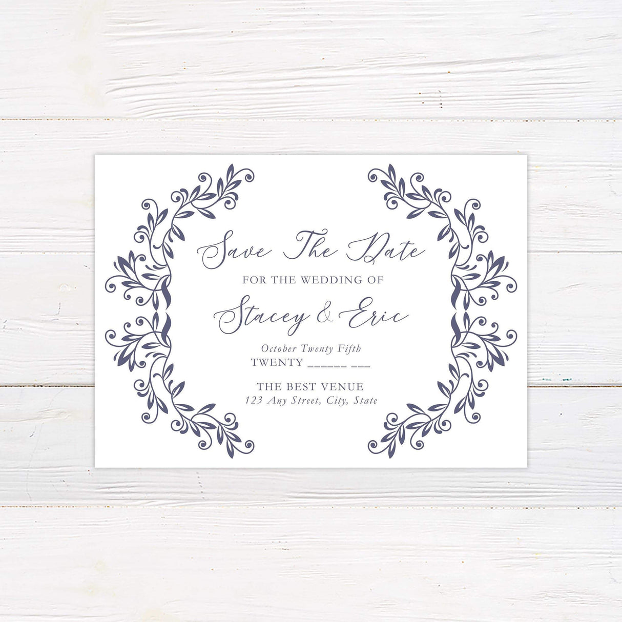 Save the date card designed with the same monogram and lavender scroll pattern, setting a stylish tone for your wedding.