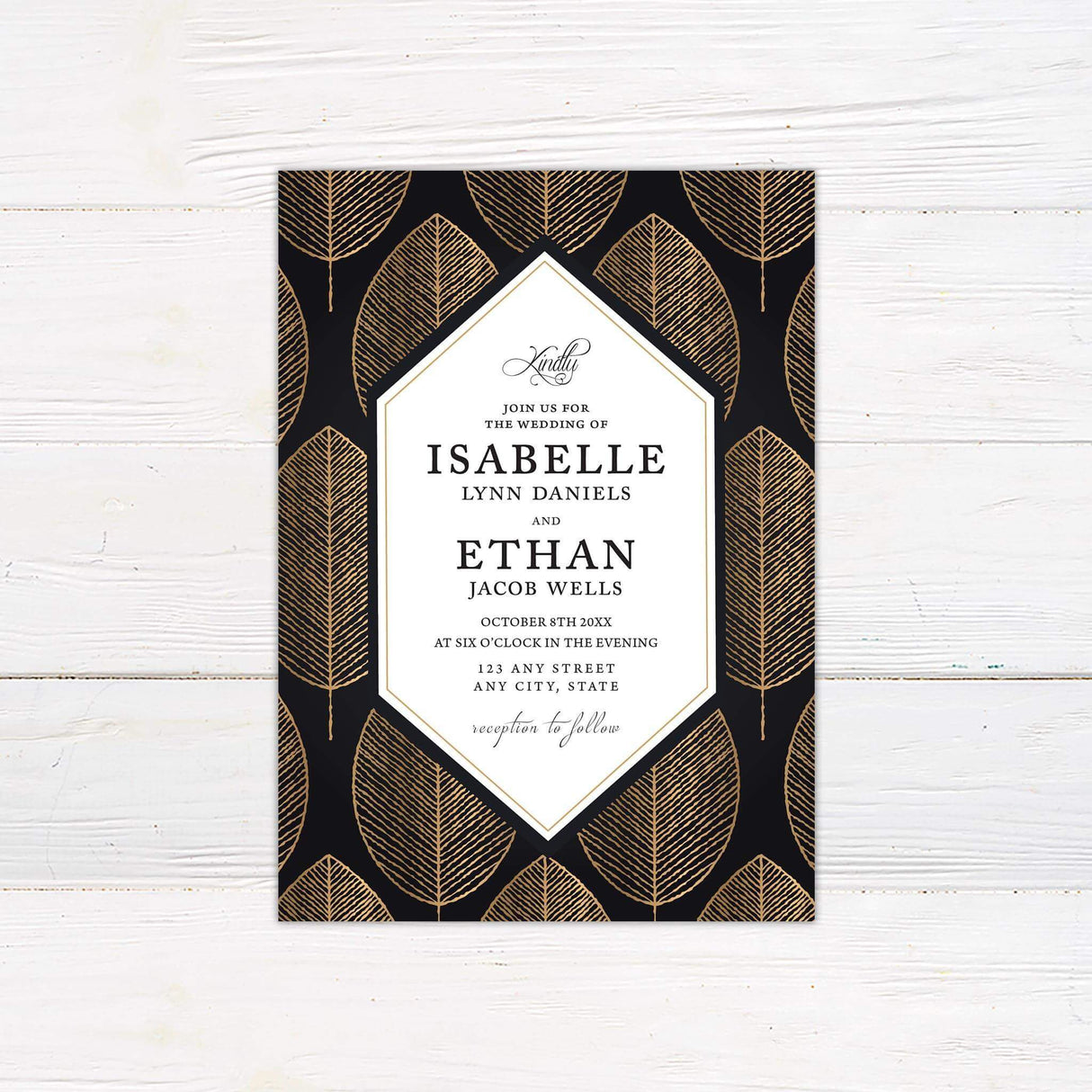 Wedding invitation with black background, gold leaf pattern, geometric white center panel, and elegant serif and script fonts.